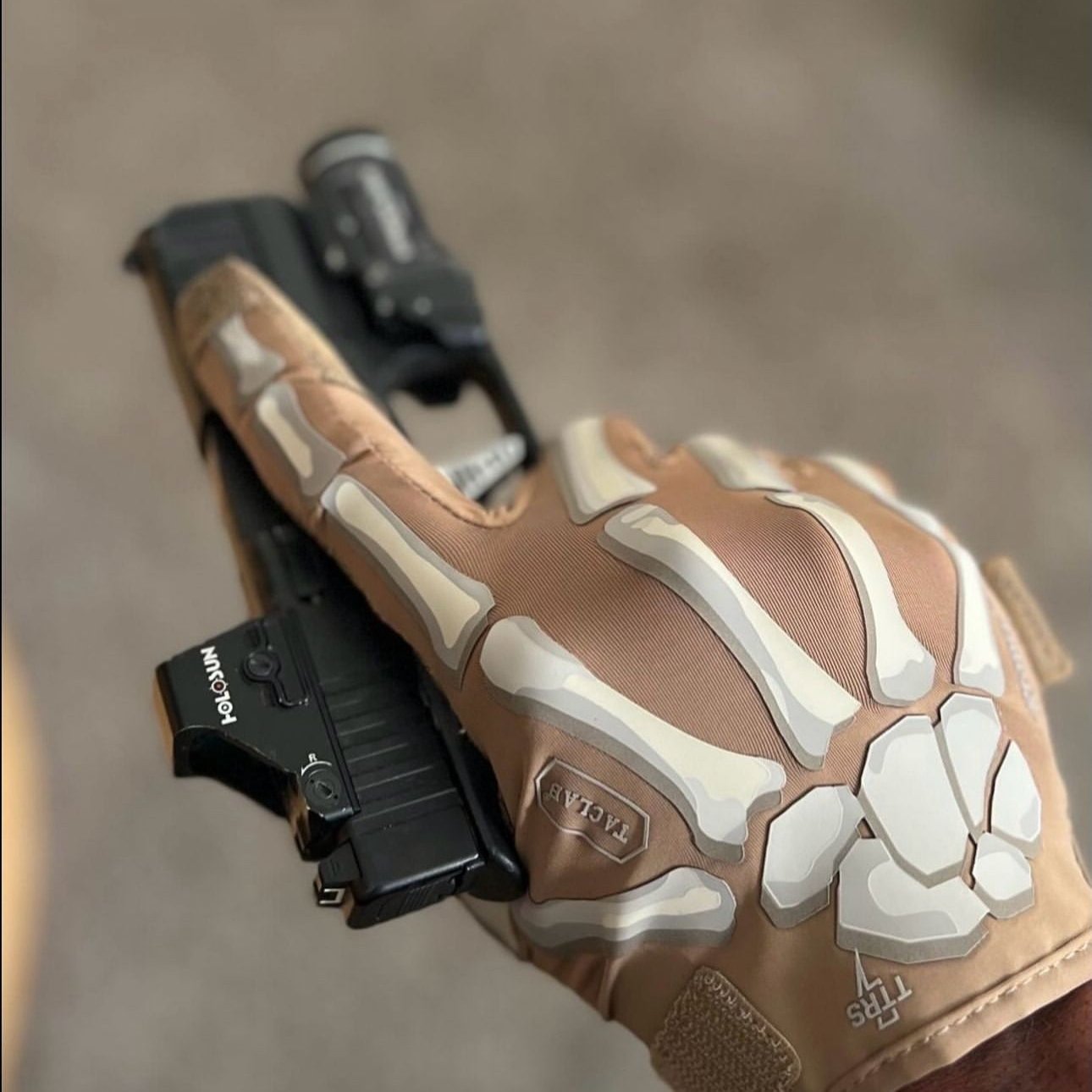 TACLAB REAPER Tactical Skeleton Gloves in Coyote, showcase wielding a firearm